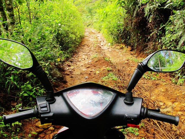 A terrible road to attempt on a 100cc scooter, but we made it in the end.